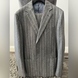 Grey pinstripe Suit Supply suit